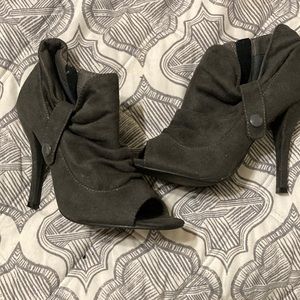 Grey Peekaboo toe ankle high heel shoe.